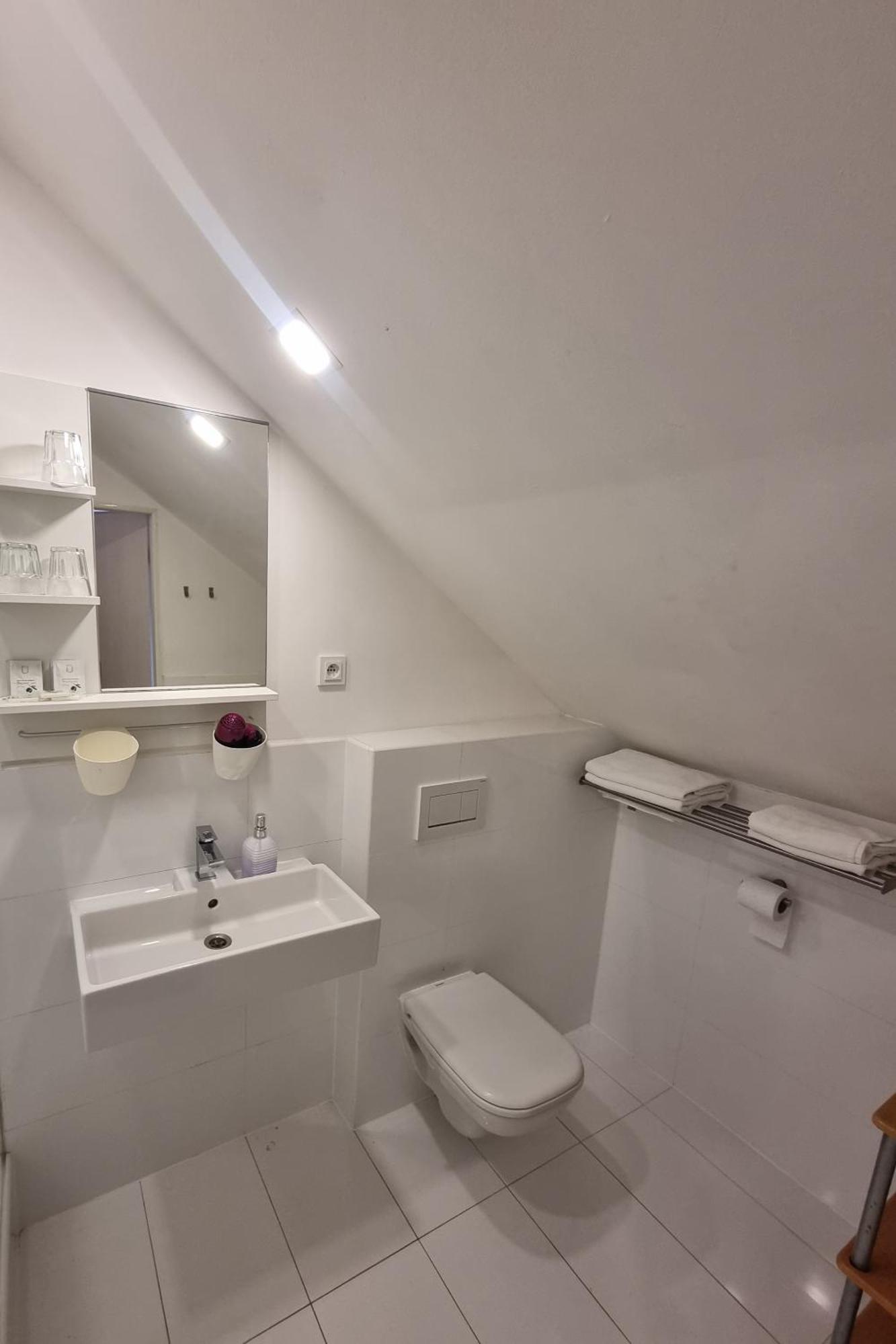 Dreibettzimmer mit Gartenblick