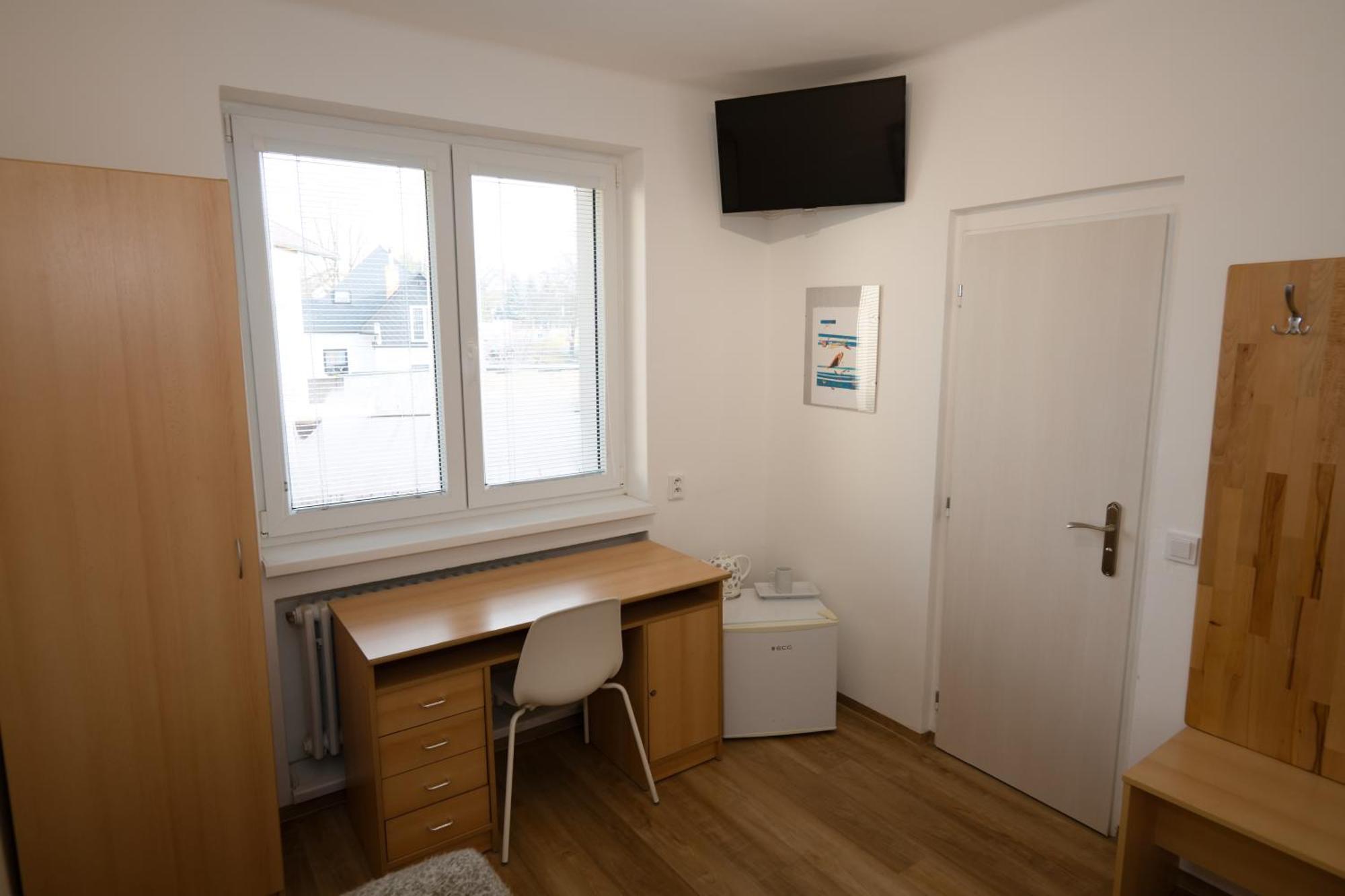 Einzelzimmer mit Gartenblick
